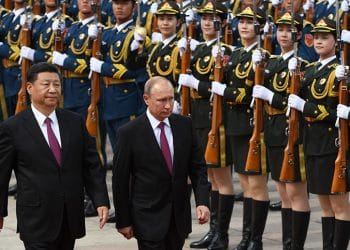 zzzzinte1TOPSHOT - Russia's President Vladimir Putin (C) reviews a military honour guard with Chinese President Xi Jinping (L) during a welcoming ceremony outside the Great Hall of the People in Beijing on June 8, 2018.
Putin arrived on June 8 for a state visit to China and will attend the Shanghai Cooperation Organisation Leaders Summit in the eastern port city of Qingdao on June 9-10. / AFP PHOTO / POOL / Greg BAKERzzzz