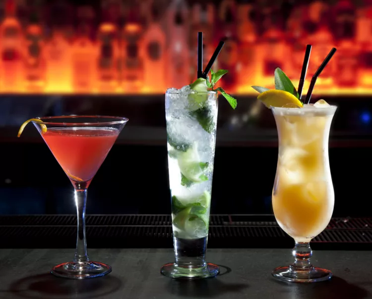 Three cocktails on the bar