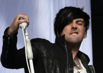 FILE - British musician Ian Watkins, lead singer of Lostprophets, as he performs on stage at V Music Festival in Hylands Park, Chelmsford, England on Aug 20, 2011. (AP Photo/Joel Ryan, File)